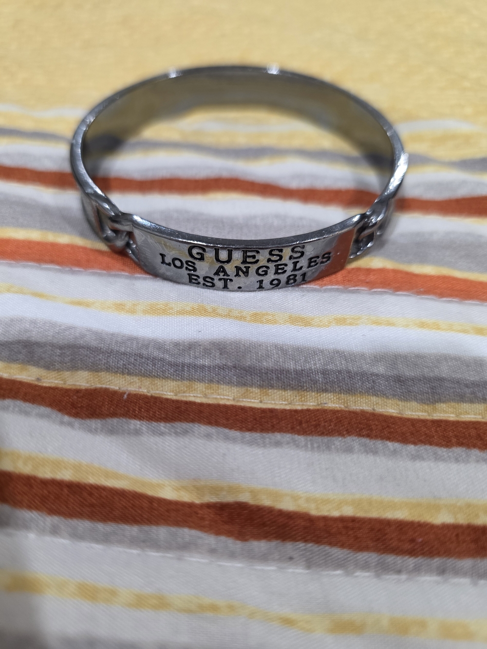 GUESS Silver Tone Logo Bangle Bracelet